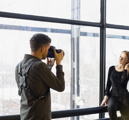 photographer-taking-pictures-young-female-model